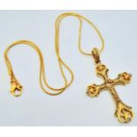 A vintage (or possibly older) fancy silver and yellow gold cross with numerous old cut diamonds.