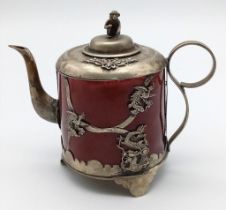 An Antique Chinese Miniature Teapot with a Red Hardstone Body. Silver mounts depicting a dragon