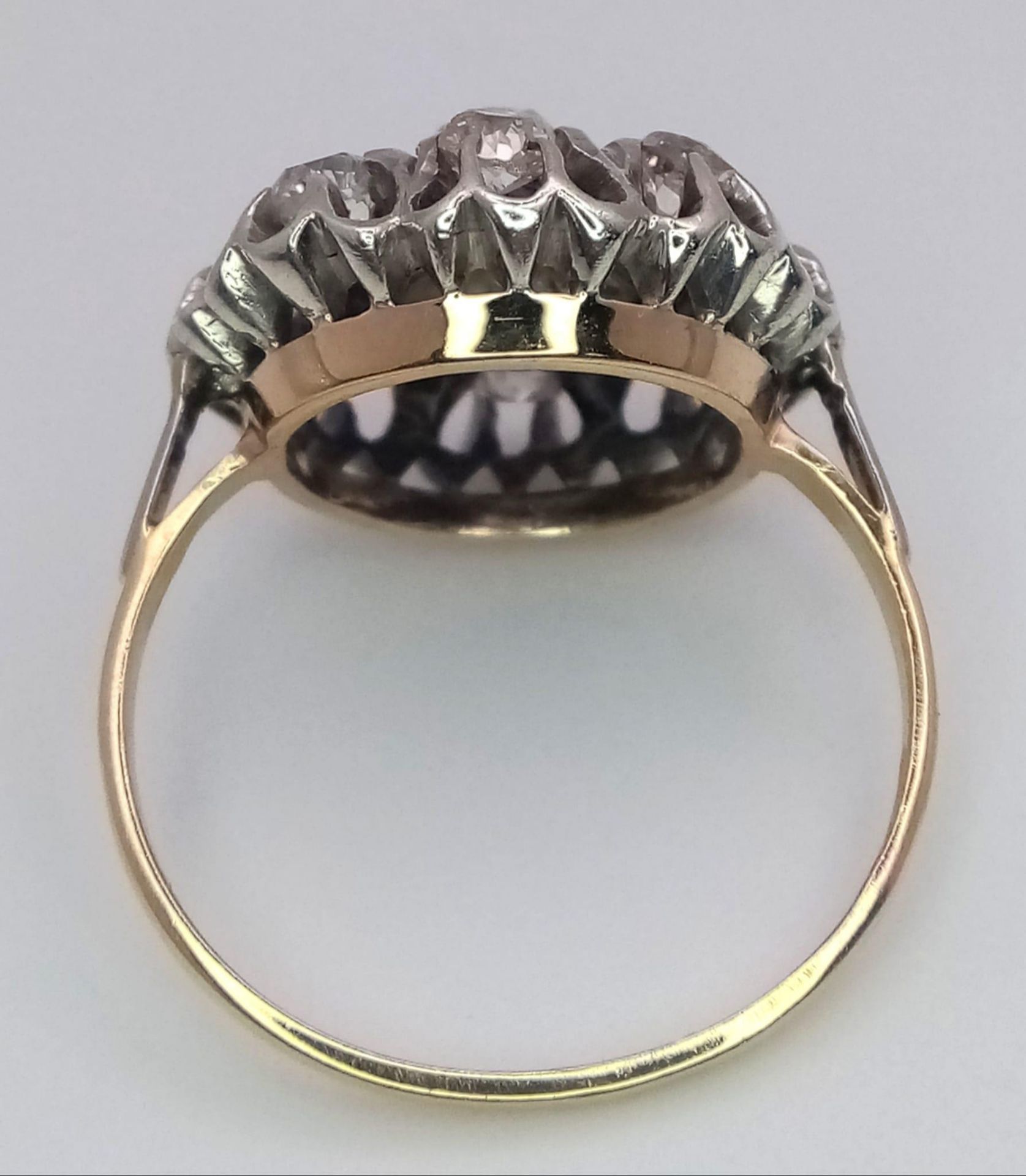 An 18K Yellow and White Gold Diamond Ring. Central brilliant round cut diamond with an eight - Image 8 of 9