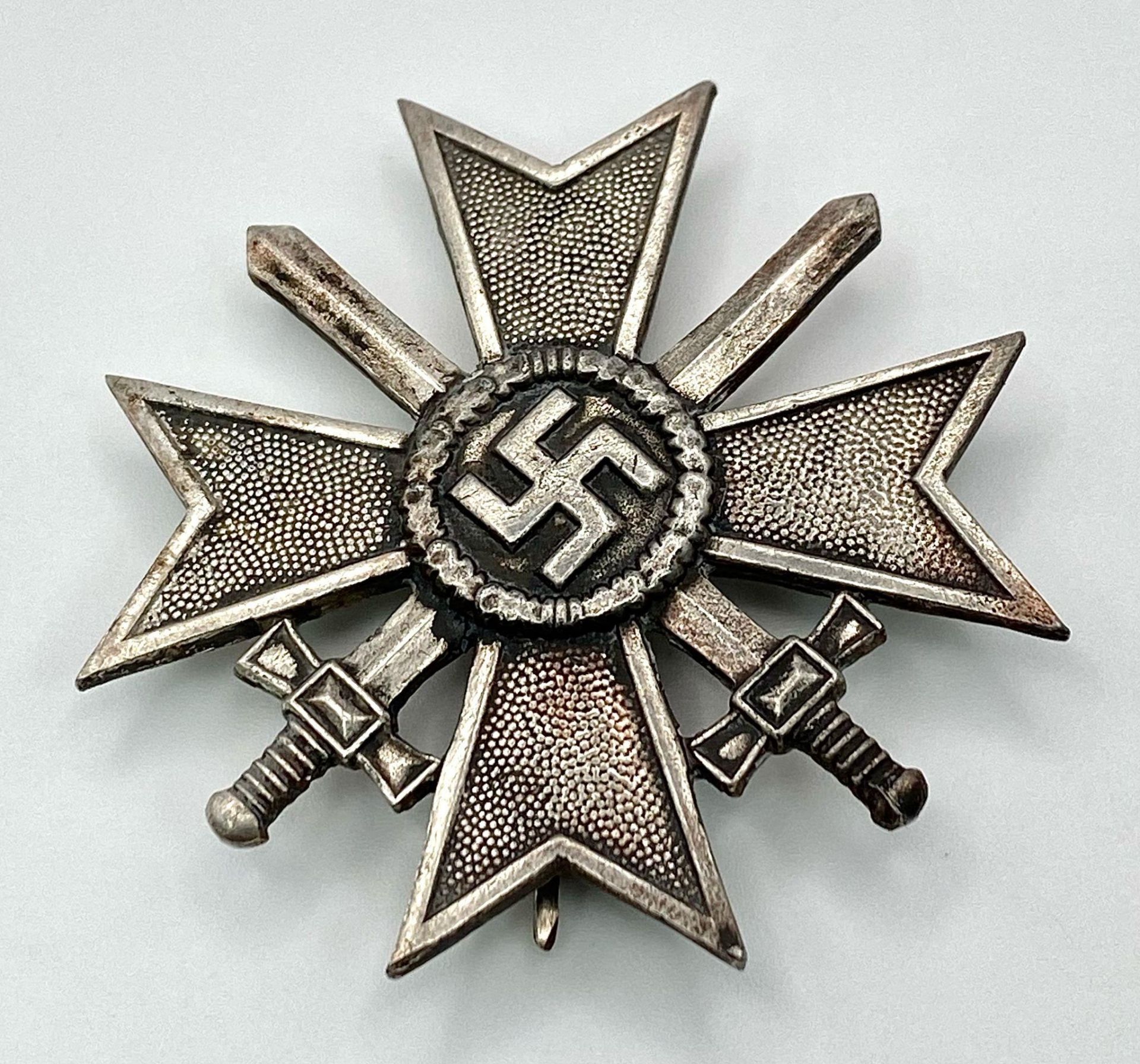 3rd Reich German War Merit Cross First Class with Swords, die-struck construction in zinc with