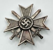 3rd Reich German War Merit Cross First Class with Swords, die-struck construction in zinc with