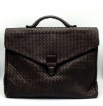 A Bottega Veneta Black Leather Briefcase. Leather intrecciato weave exterior with a large zipped