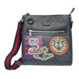 Gucci Night Courier Crossbody Bag. Classic GG canvas, patch detail, logo patch to the front, front
