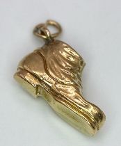 A 9k yellow gold boot charm. 0.6g