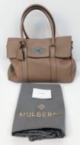 A Mulberry Large Brown Leather Handbag. Textured brown leather exterior with silver tone hardware.