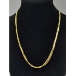 A very feminine, 9 K yellow gold, four chain necklace. length: 43 cm, weight: 9 g.