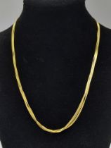 A very feminine, 9 K yellow gold, four chain necklace. length: 43 cm, weight: 9 g.