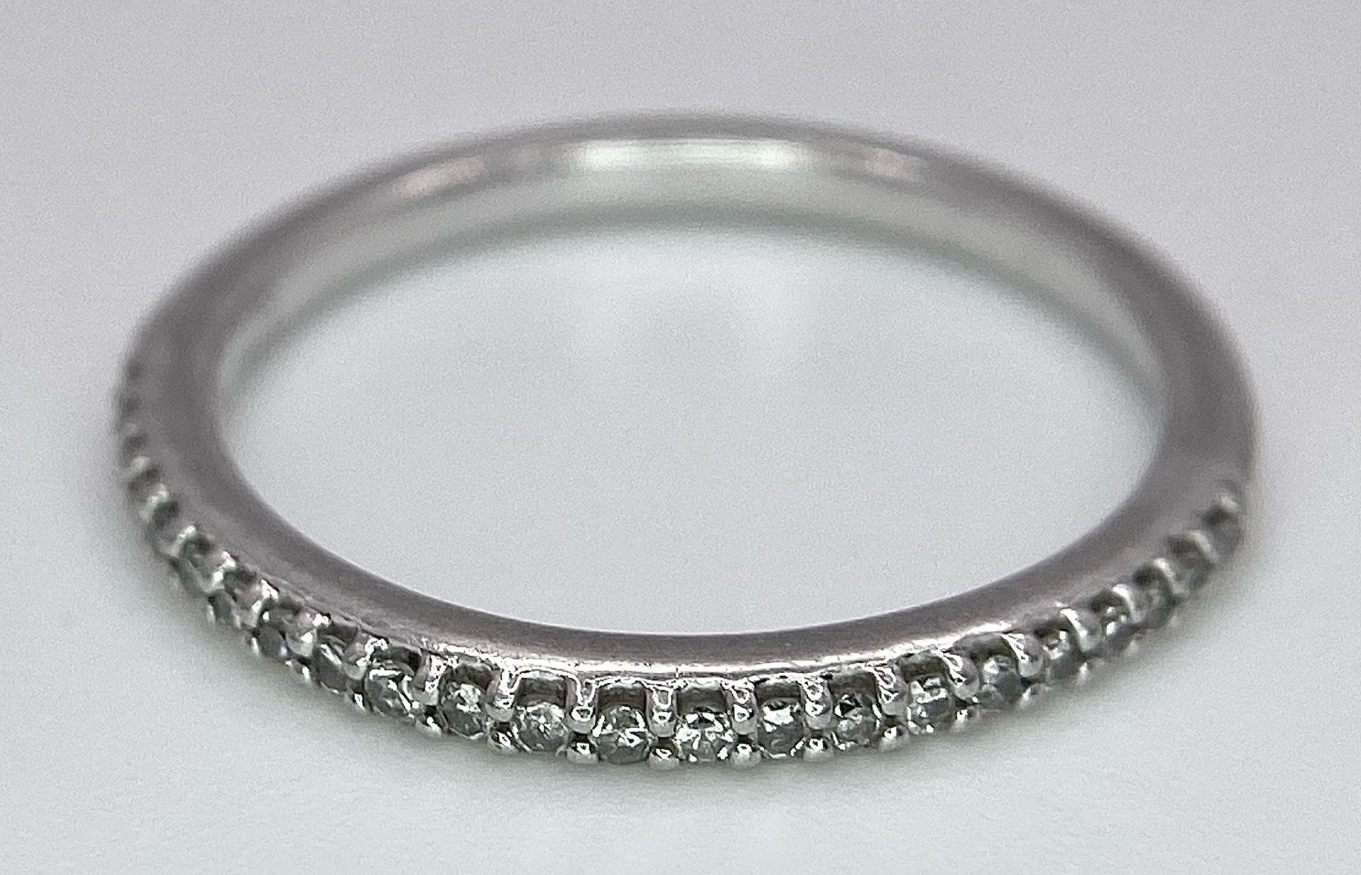 A 950 PLATINUM DIAMOND SET BAND RING. TOTAL WEIGHT 2.5G. SIZE K - Image 2 of 6