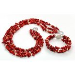 An exotic looking three row red coral and natural pearls necklace and bracelet. Necklace length: