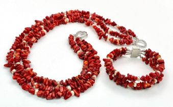 An exotic looking three row red coral and natural pearls necklace and bracelet. Necklace length: