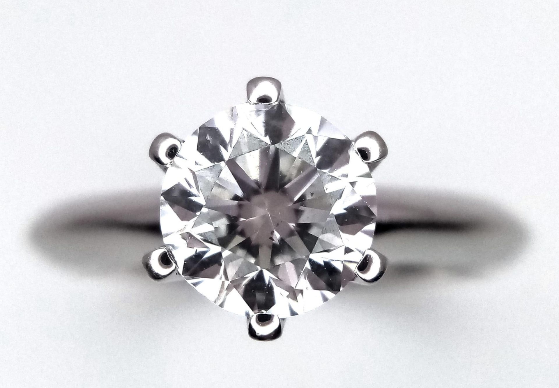 An 18K white Gold 1ct Diamond Solitaire Ring. Brilliant round cut diamond. Comes with an IGI - Image 3 of 9