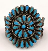 A Vintage Native American Indian Silver and Turquoise Cuff Bracelet. Inlaid geometric teardrop