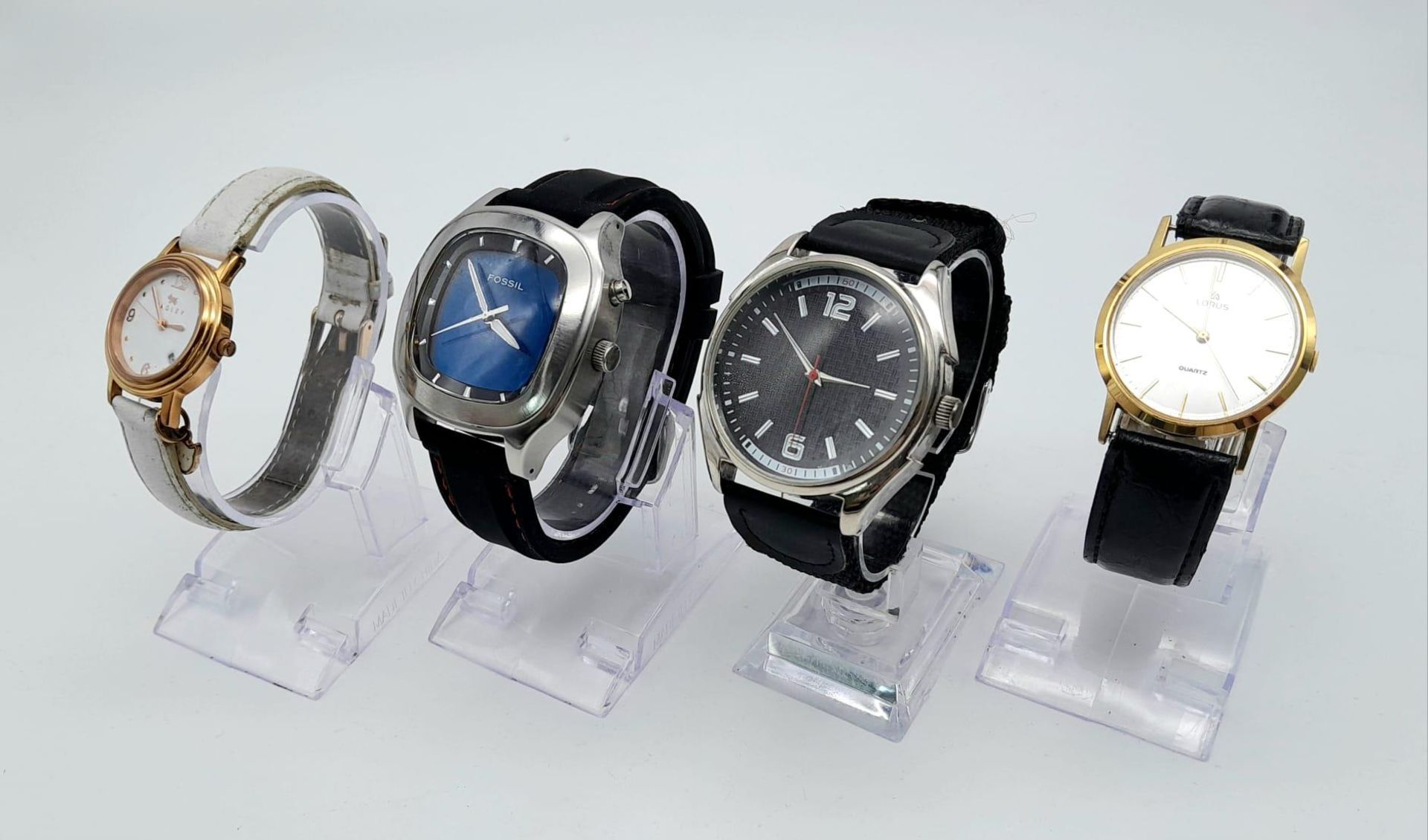A Parcel of 4 Ladies and Men’s Watches Including a 20 Capacity Black Leatherette Display Case.