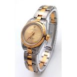 A ROLEX LADIES BI-METAL AUTOMATIC WATCH WITH GOLDTONE DIAL , LATEST STYLE STRAP AND ORIGINAL ROLEX