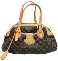 A Louis Vuitton Monogram Etoile Bowling Bag. Quilted leather exterior with gold-toned hardware,