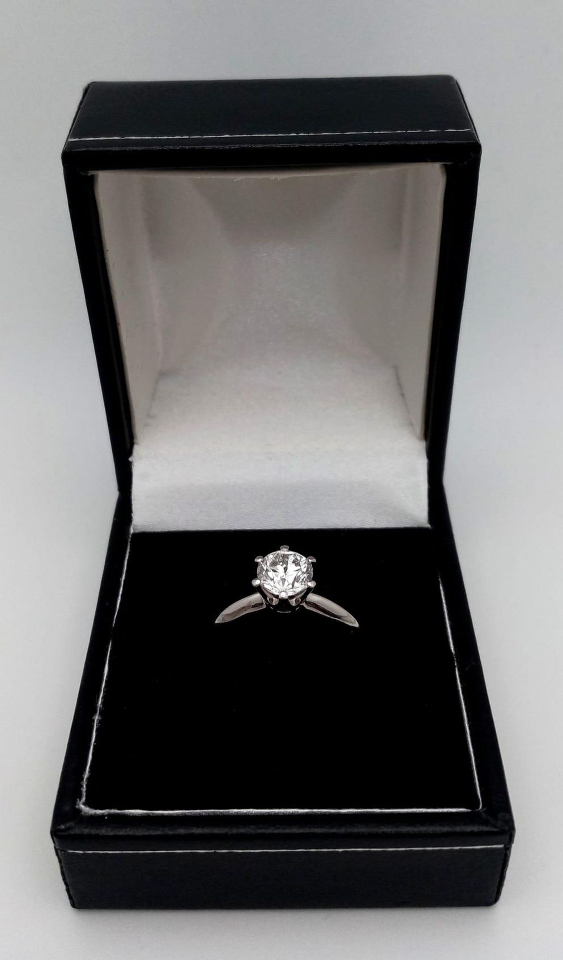 An 18K white Gold 1ct Diamond Solitaire Ring. Brilliant round cut diamond. Comes with an IGI - Image 8 of 9