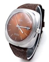 AN OMEGA "DE VILLE DYNAMIC" WITH VERY RARE COLOURED DIAL ,CIRCA 1967 AUTOMATIC BROWN WITH DATE BOX