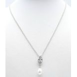 A fancy 925 silver marquise CZ with pearl pendant on silver silver chain. Total weight 5.5G. Total