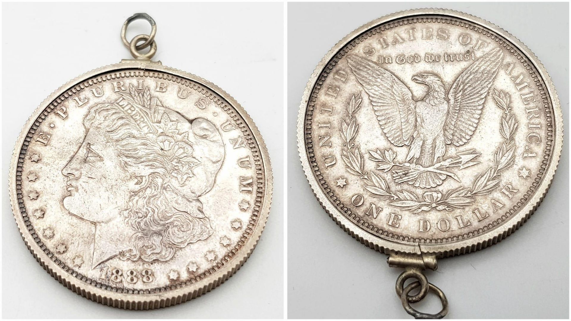 AN 1888 SILVER DOLLAR FROM THE U.S.A. IN PENDANT SETTING . 30gms