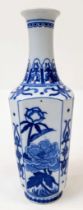 A Chinese Blue and White Single Stem Vase. Markings on base. Floral decoration throughout. 18cm tall