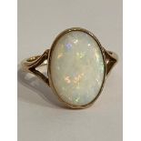 Stunning 9 carat GOLD and OPAL RING. Having a WHITE FIRE OPAL Mounted to top. Full hallmark.