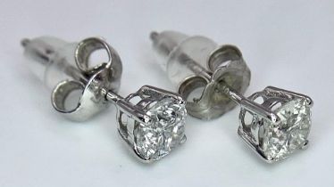 A Pair of 18K Diamond Stud Earrings. Two brilliant round cut diamonds. 0.75ctw. 1.07g total