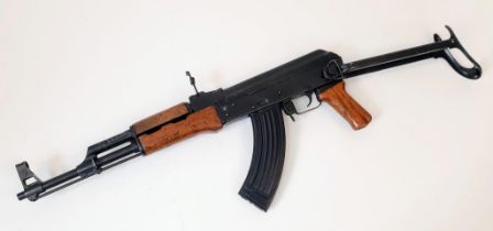 A Chinese Deactivated Type 56 Vintage Assault Rifle. Matching numbers, battle worn finish with