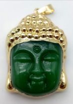 A Gilded Jade Buddha Head Pendant. 4.5cm.