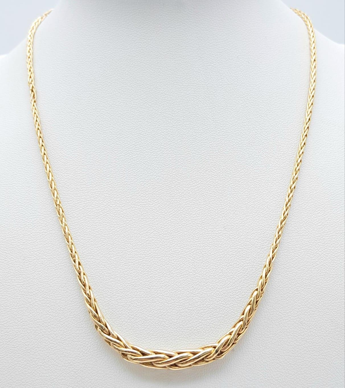 A Vintage 9K Yellow Gold Woven Link Necklace. 42cm length. 5.7g weight.