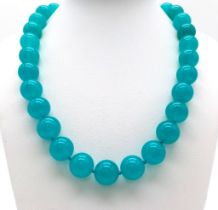 A Large Sky Blue Chalcedony Bead Necklace. 14mm beads. 42cm necklace length.