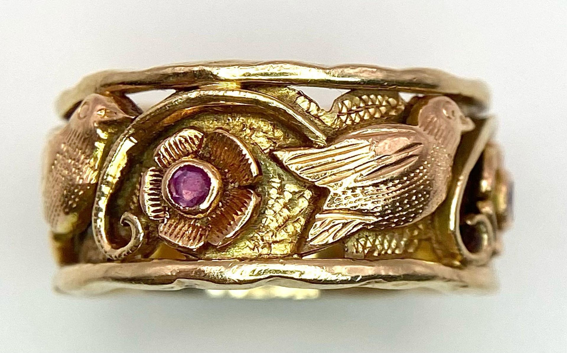 A Beautifully Decorated Bird and Floral 14K Rose Gold and Ruby Band Ring. Size N. 7.5g total weight. - Image 2 of 6
