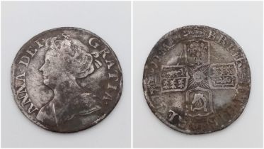 A 1711 Queen Anne Silver Sixpence. Please see photos for conditions.