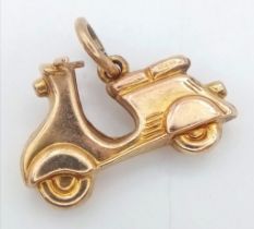 A 9K YELLOW GOLD SCOOTER CHARM. TOAL WEIGHT 0.8G