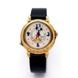 A Lorus Mickey Mouse Happy Birthday Quartz Watch. Black leather strap. Gilded case - 33mm. Mickey