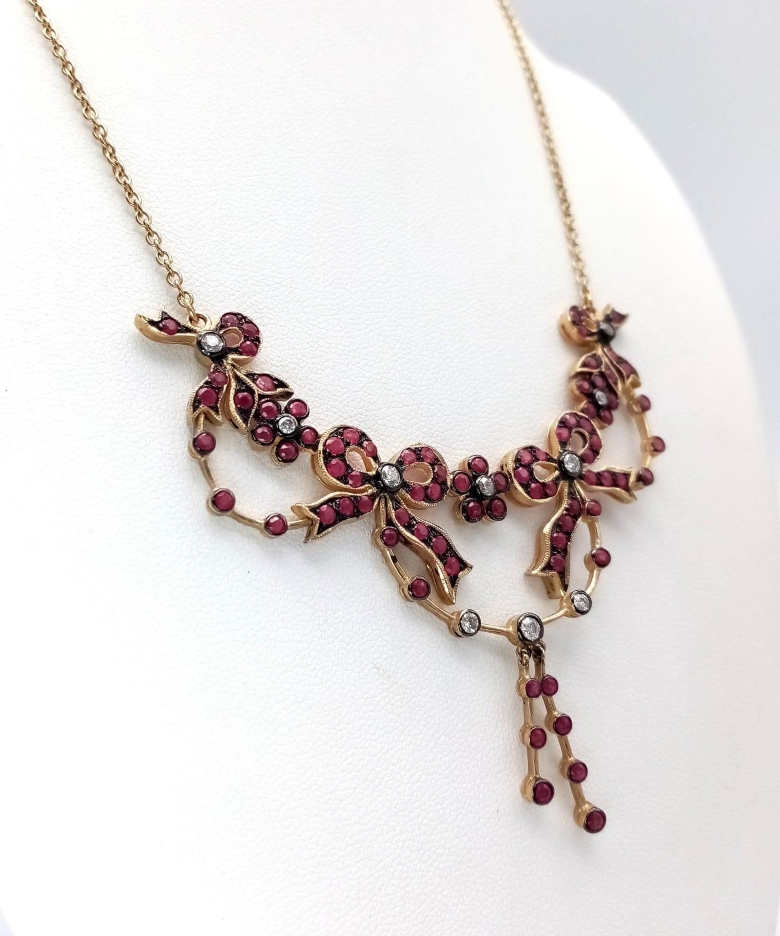 An Art Deco Style 9K Yellow Gold Ruby and Diamond Lavaliere Necklace. Floral and bow decoration. - Image 3 of 7