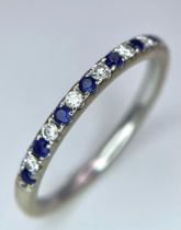 A 14ct white gold diamond and sapphire half eternity ring, set with 9 diamonds and 10 sapphires, 1.