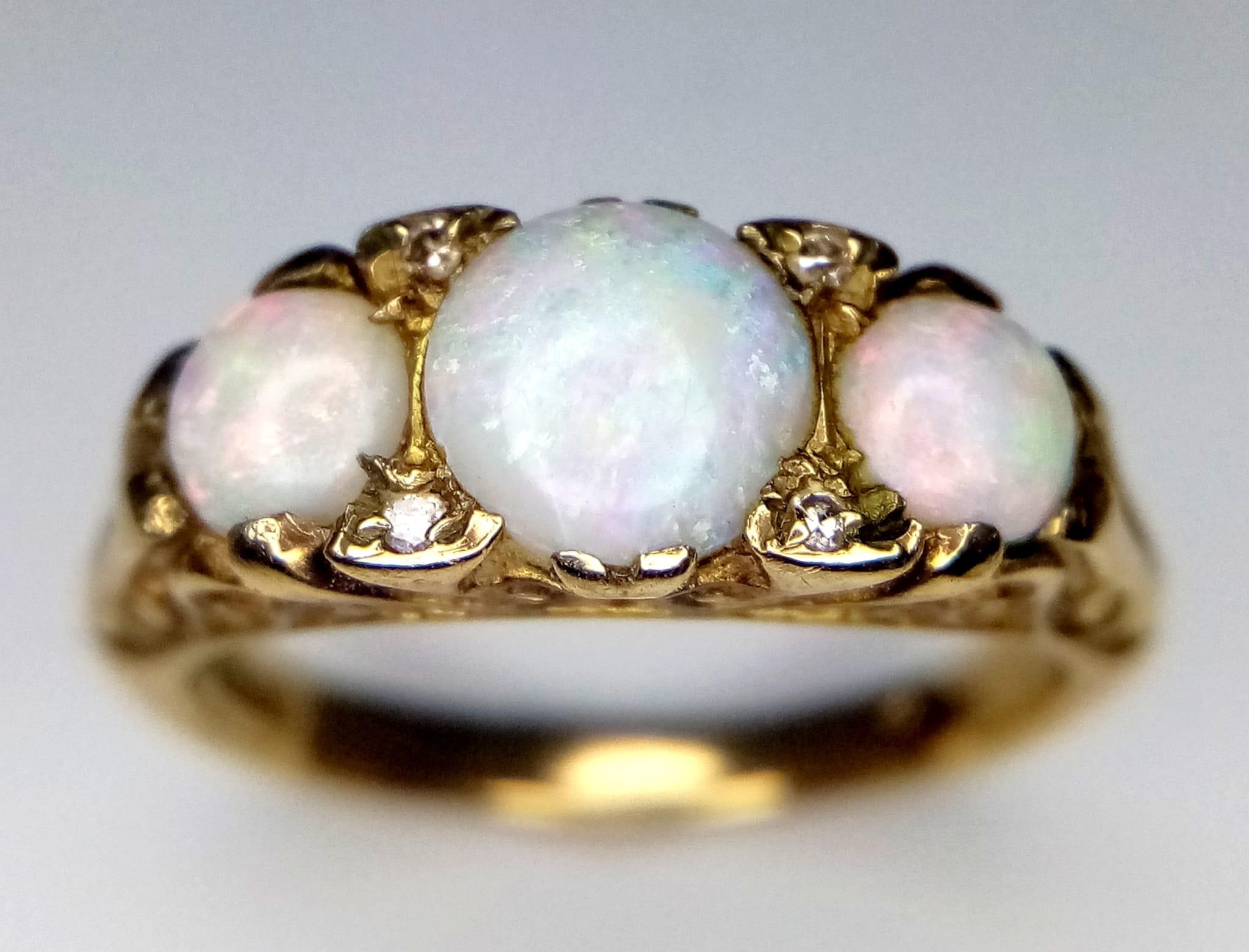 A Wonderful Vintage 9K Yellow Gold and Three Opal Ring. Excellent colour-play. Size I. 3.25g weight. - Image 2 of 4
