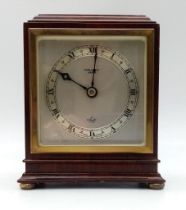 A VINTAGE CLOCKWORK MANTLE CLOCK MADE BY SEARLE & CO LTD , LONDON . WITH "ELLIOTT" WORKS HOUSED IN A