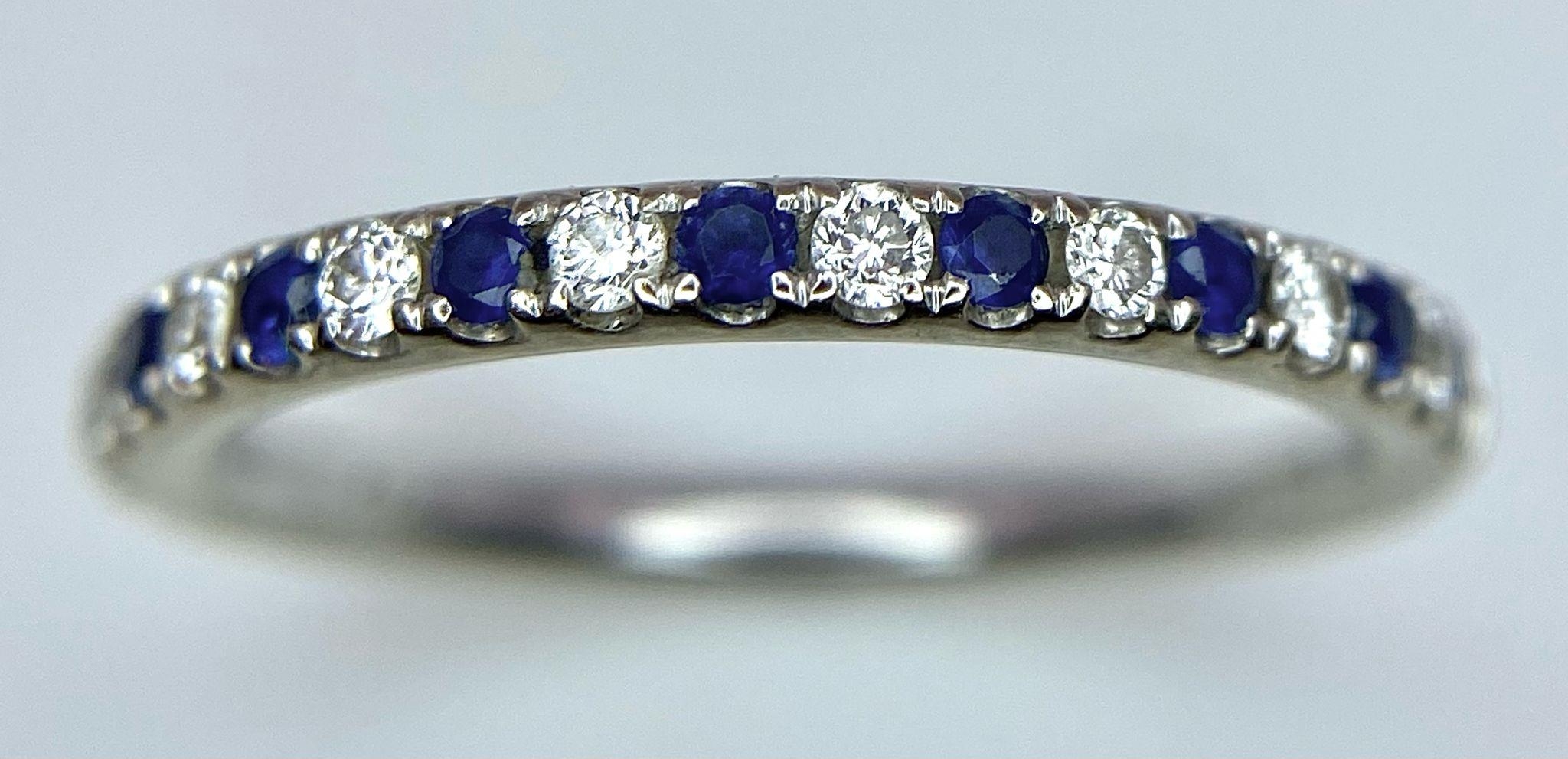 A 14ct white gold diamond and sapphire half eternity ring, set with 9 diamonds and 10 sapphires, 1. - Image 3 of 7