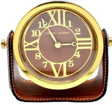 A RARE "RALPH LAUREN" PLISHED BRASS AND LEATHER MANTEL CLOCK , QUARTZ MOVEMENT. DIAMETER OF CLOCK