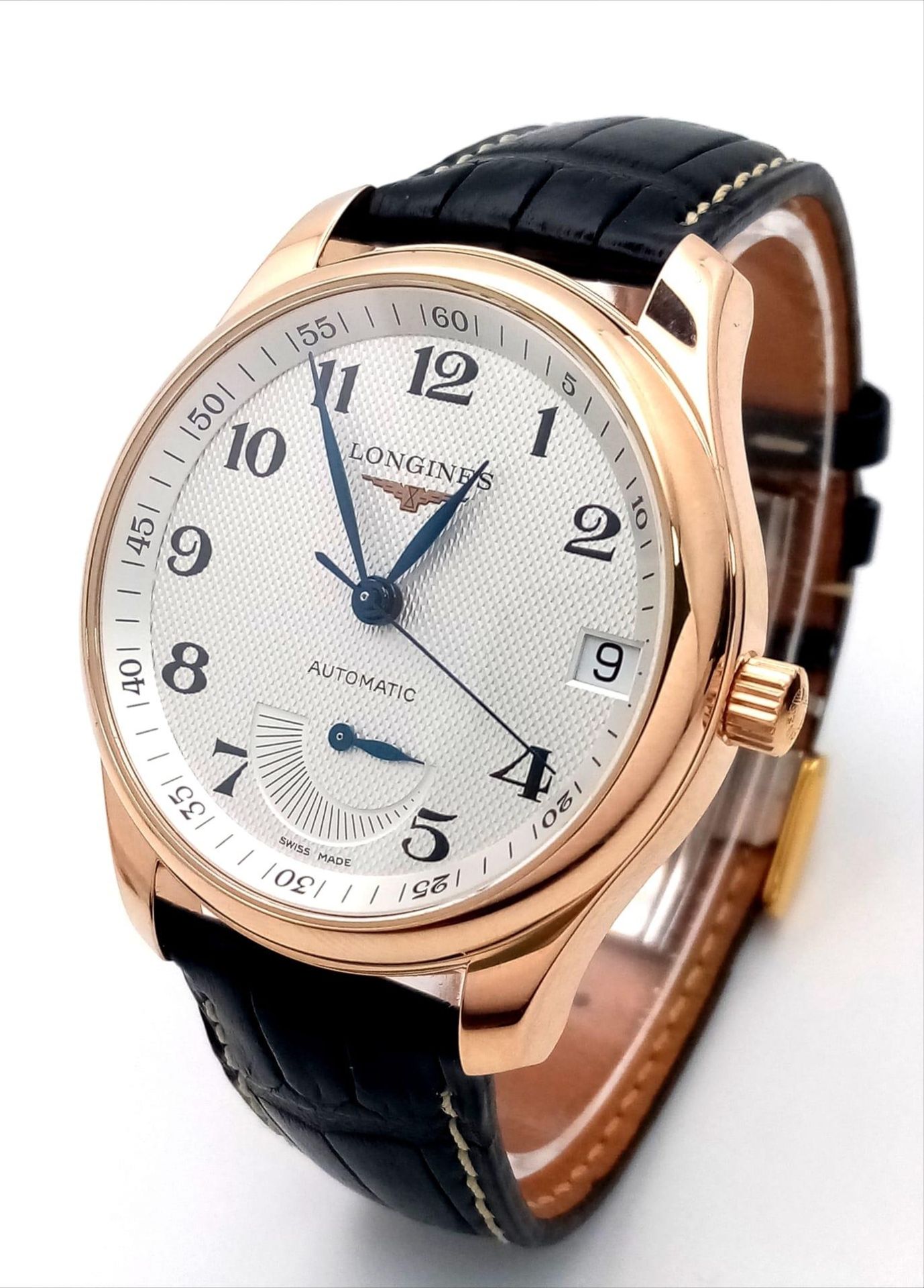 A Glorious Longine 18K Rose Gold Automatic Gents Watch. Black Alligator leather strap. 18K rose gold
