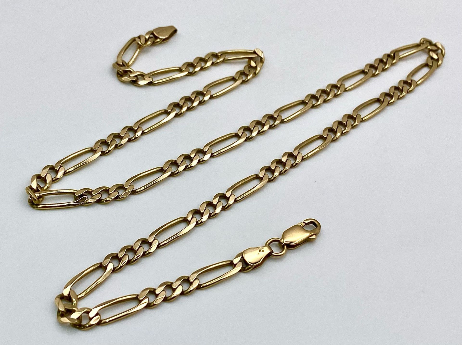 A Vintage 9K Yellow Gold Figaro Link Necklace. 45cm length. 14.1g weight.