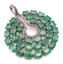 An Emerald Circular Pendant with 13.55ct of Emeralds and 0.40ct of Diamond Accents set in 925