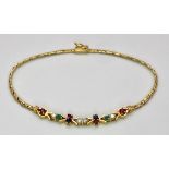 A 18K YELLOW GOLD DIAMOND AND GEM SET BRACELET. TOTAL WEIGHT 5.1G. TOTAL LENGTH 20CM.