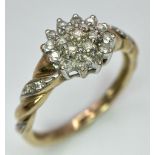 A 9K YELLOW GOLD 0.25CT DIAMOND CLUSTER RING. TOTAL WEIGHT 2.7G. SIZE Q