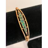 Vintage 9 carat GOLD BANGLE Set to top with green gemstones. Having clear hallmark for Smith and