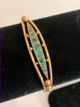 Vintage 9 carat GOLD BANGLE Set to top with green gemstones. Having clear hallmark for Smith and