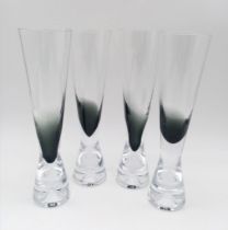 A set of four stylish Tom Dixon tank champagne glasses. In lovely condition. 22.5cm tall.