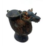 An Antique Chinese Bronze Ram's Head Lidded Drinking Vessel. Nice patina with ornate decorative work