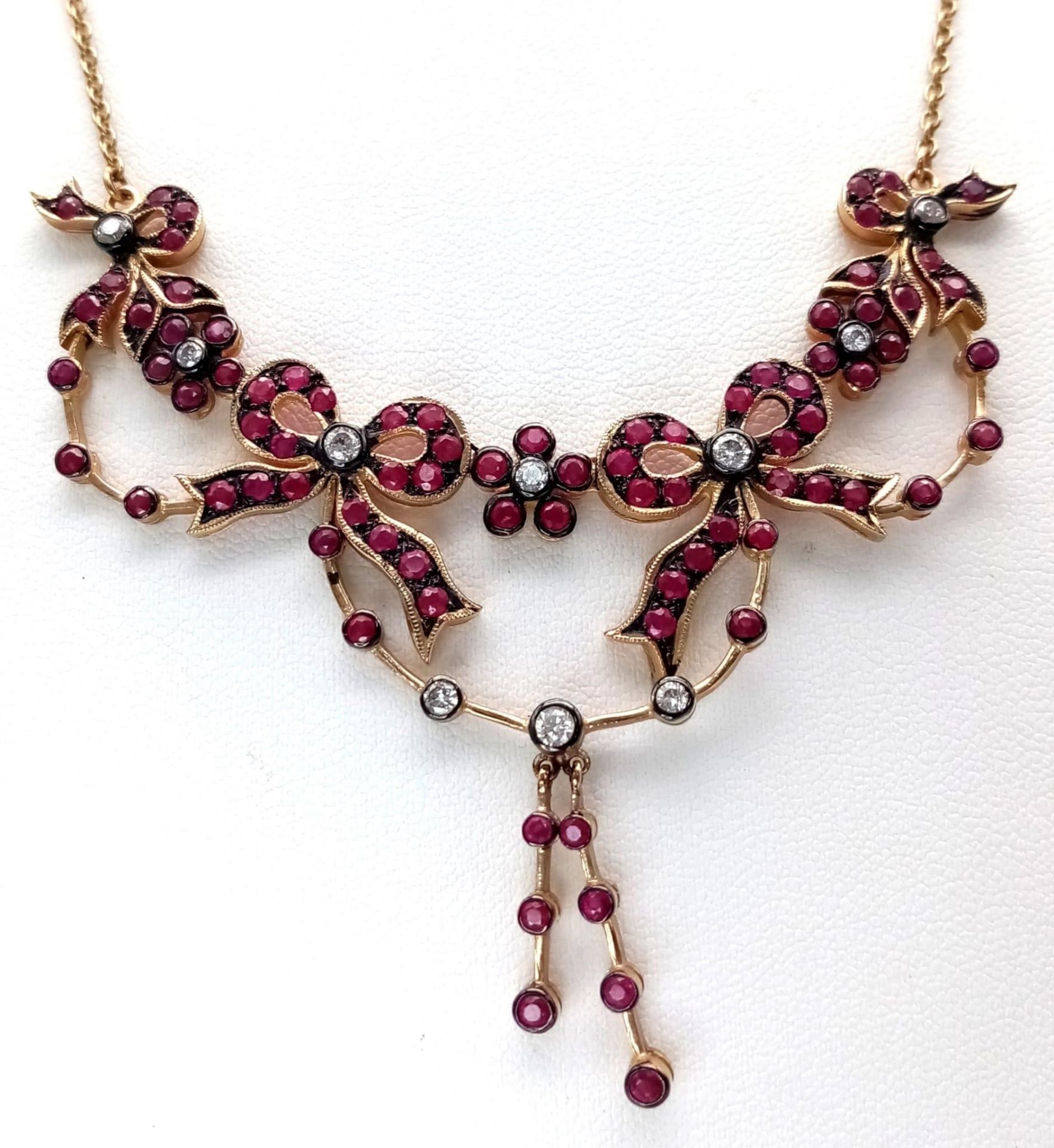 An Art Deco Style 9K Yellow Gold Ruby and Diamond Lavaliere Necklace. Floral and bow decoration. - Image 2 of 7